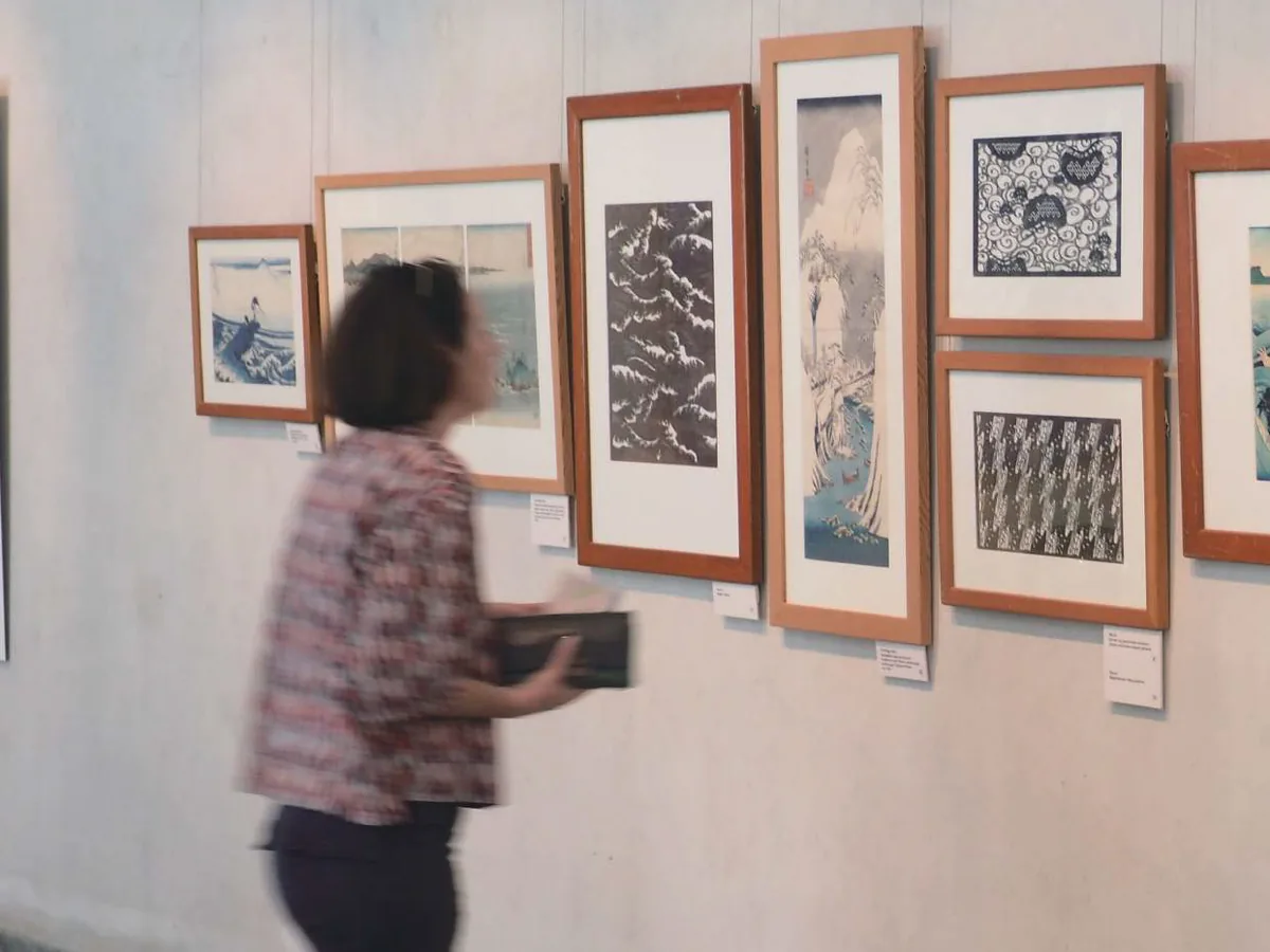 Gallery artwork displayed with professional picture hanging systems