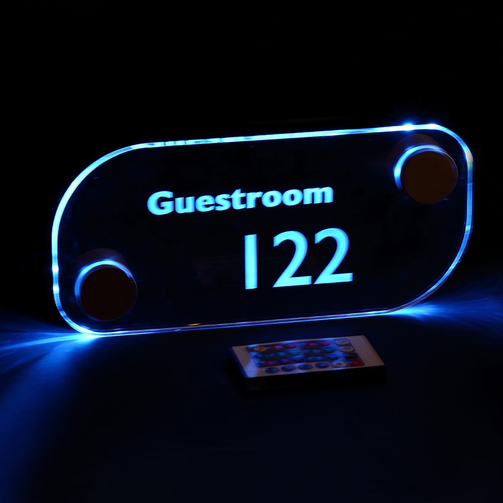 LED sign standoffs illuminating an acrylic room directory sign panel