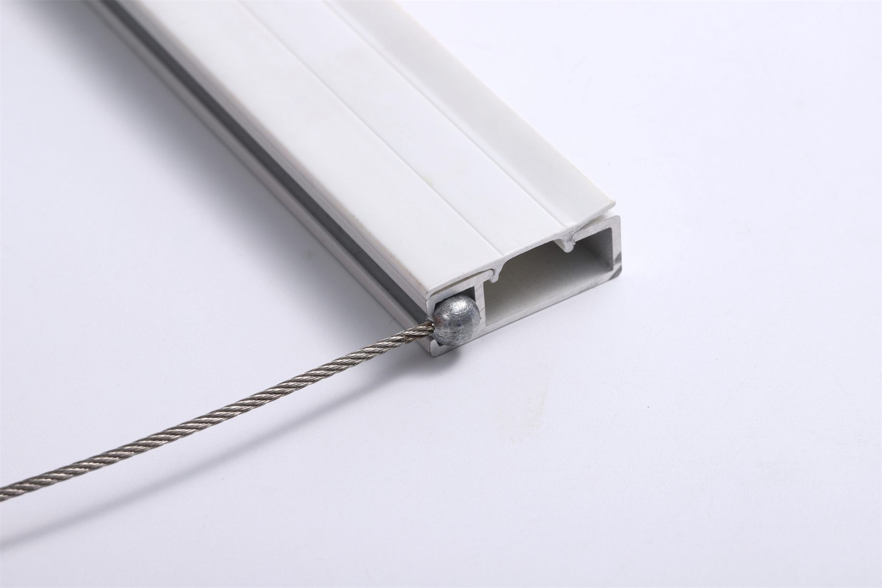 Cable hanger component for Click Track picture hanging rail systems